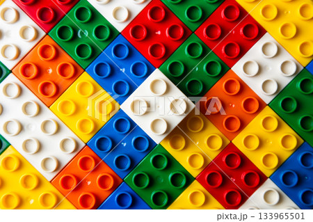Colorful plastic building blocks forming diagonal pattern 133965501