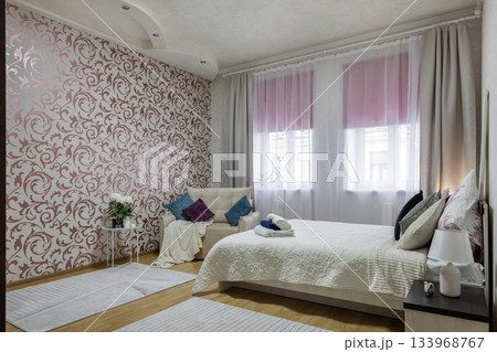 Elegant Bright Bedroom Interior with Patterned Wall Elegant Bright Bedroom Interior with Patterned Wall 133968767