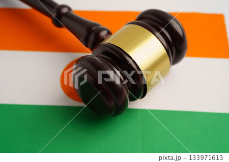 Niger law, Legal, justice and agreement, wooden court gavel on flag. Niger law, Legal, justice and agreement, wooden court gavel on flag. 133971613