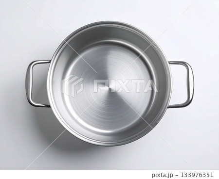 Kitchen atmosphere. Frying pan on white background. Cooking concept. Top view. Kitchen atmosphere. Frying pan on white background. Cooking concept. Top view. 133976351