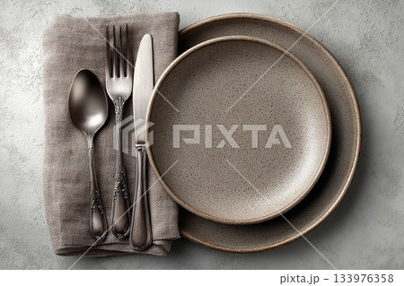 Upscale restaurants. Silverware set. Fork, knife and spoon. Showcasing classic design. Rustic themed. 133976358