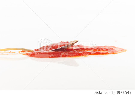 tomato ketchup isolated on white background spoon 133978545