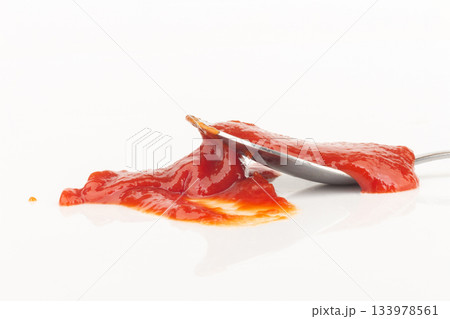 tomato ketchup isolated on white background spoon tomato ketchup isolated on white background spoon 133978561
