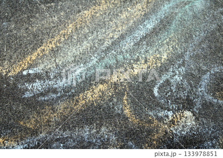Close up of chalk pastel scribbles on a black paper background abstract Close up of chalk pastel scribbles on a black paper background abstract 133978851