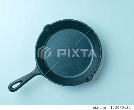 Presentation. Cast iron pan. Kitchenware on white background. Top view. 133979120