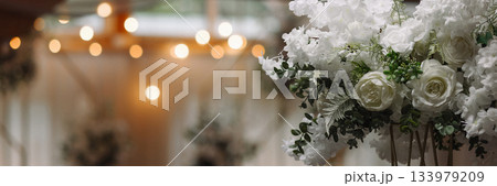 Banner white wedding flowers with blurred lights background and copy space Banner white wedding flowers with blurred lights background and copy space 133979209