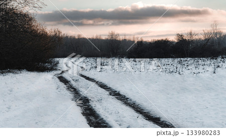 Snowy Rural Road at Sunset - Winter Countryside Landscape Snowy Rural Road at Sunset - Winter Countryside Landscape 133980283