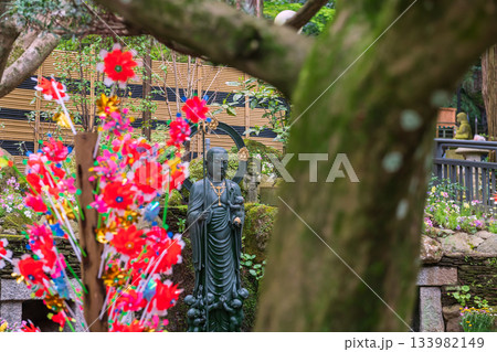 Jizo Bosatsu Buddha statue with flower toy of Nanzoin temple, Fukuoka 133982149