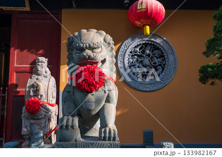 Chinese Imperial guardian lion in front of Longhua temple, Shanghai 133982167