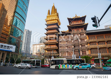 Jing'an temple and motion traffic vehicles on street intersection, Shanghai 133982181