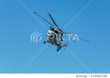 Military helicopter in sky Military helicopter in sky 133982286