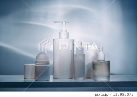 Skincare cosmetic products minimalist arrangement on shelf Skincare cosmetic products minimalist arrangement on shelf 133983073