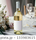 Wine bottle mockup with blank label and romantic flower background for a wedding day. 133983615