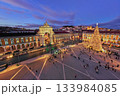 Praca do Comercio in Lisbon features a large Christmas tree and festive lights during evening twilight in winter. Lisbon, Portugal 133984085