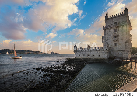 Belem Tower or Tower of St Vincent - famous tourist landmark of Lisboa and tourism attraction - on the bank of the Tagus River Tejo on sunset. Lisbon, Portugal 133984090