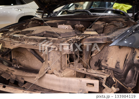 Careful precision is essential when installing a car headlight assembly for optimal performance Careful precision is essential when installing a car headlight assembly for optimal performance 133984119