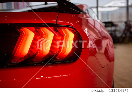 Closeup of a cars automotive tail brake light 133984175