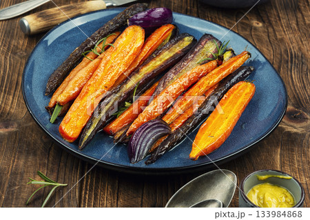 Delicious roasted baby carrots. 133984868