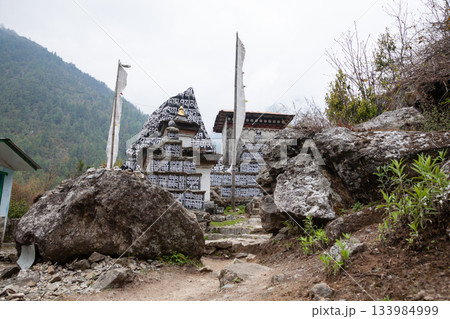 Rocks painted with prayers along EBC trek, Nepal 133984999
