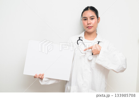 Asian Female Doctor Holding Medical Placard on White Background for Healthcare Advertisement 133985708