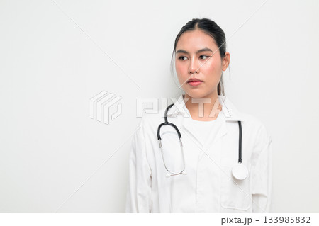 Woman Doctor with Stethoscope in White Uniform on Plain Background Woman Doctor with Stethoscope in White Uniform on Plain Background 133985832