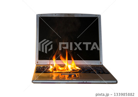 Burning laptop and keyboard, equipment fire due to faulty battery and wiring. On a white background, isolate. 133985882