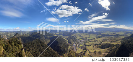 Panoramic view of Pieniny Mountain Valley View Over Village and Dunajec River Under Bright Blue Sky Panoramic view of Pieniny Mountain Valley View Over Village and Dunajec River Under Bright Blue Sky 133987382
