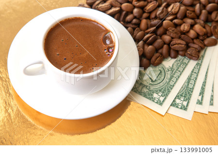 The image showcases a cup of aromatic Turkish coffee with roasted beans The image showcases a cup of aromatic Turkish coffee with roasted beans 133991005
