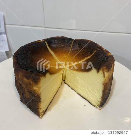 Rich and creamy burnt cheesecake with a caramelized top and a soft, velvety center. A perfect balance of deep, toasty flavor and smooth texture for an indulgent dessert. Rich and creamy burnt cheesecake with a caramelized top and a soft, velvety center. A perfect balance of deep, toasty flavor and smooth texture for an indulgent dessert. 133992947