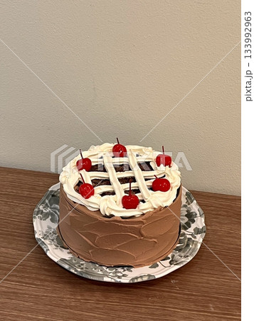 A delicious, fluffy cake with layers of rich flavor, perfect for any occasion. Often topped with frosting or fresh fruits, it's a sweet treat that brings joy to every bite. 133992963