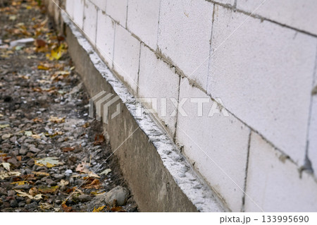 Foundation and wall.Construction of new extension from aerated concrete blocks 133995690