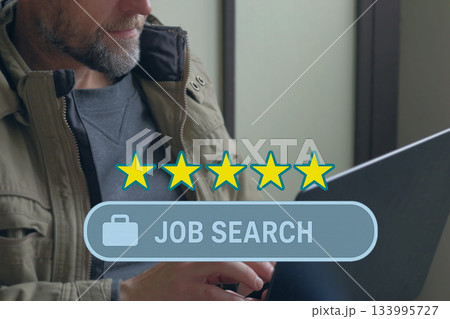 Job search rating and laptopMan typing on laptop during online job search with five-star rating overlay, concept of employment, resume review and professional recruitment platforms. Job search rating and laptopMan typing on laptop during online job search with five-star rating overlay, concept of employment, resume review and professional recruitment platforms. 133995727