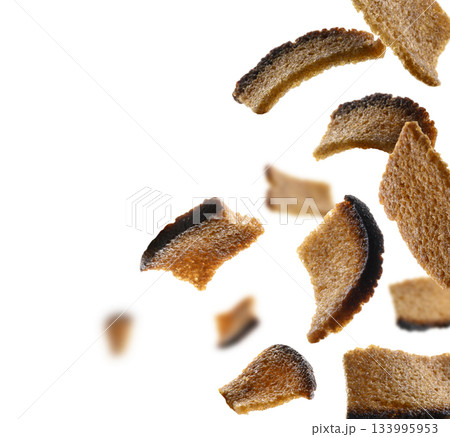 Rye croutons levitate on a white background Rye croutons levitate on a white background 133995953