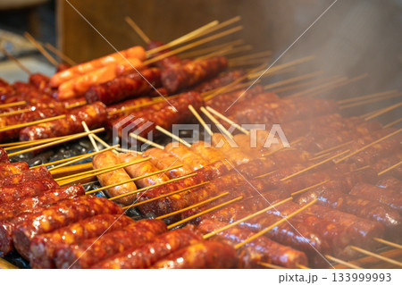 Grilled skewers of meat at a night market 133999993