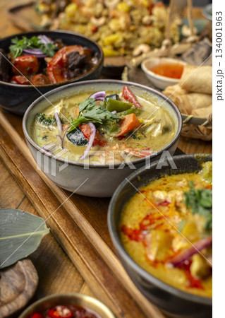 mix of traditional thai curries on restaurant table in phuket thailand 134001963