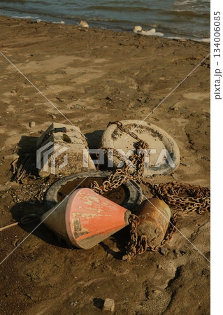 Worn Buoy Chain And Weathered Concrete Worn Buoy Chain And Weathered Concrete 134006085