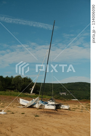 Sailing Boat Moored Beside Green Bank 134006090