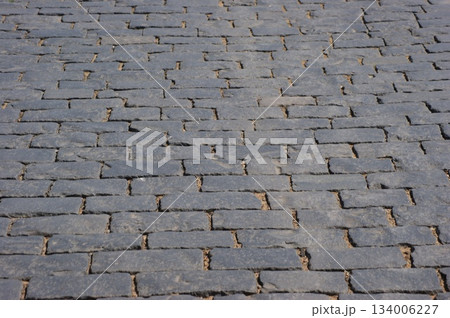 The photograph shows a section of the paving stones of Red Square in Moscow. The photograph shows a section of the paving stones of Red Square in Moscow. 134006227