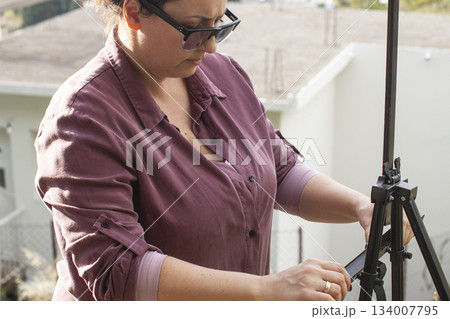 mature woman outside painting picture, lifestyle people concept 134007795