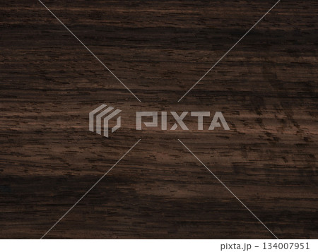 Ebony veneer surface with dark, enigmatic streaks and subtle texture 134007951