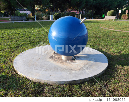 Parallel map, model of earth in park for studying seasonality and other natural changes. Education and science, astronomy. Parallel map, model of earth in park for studying seasonality and other natural changes. Education and science, astronomy. 134008033