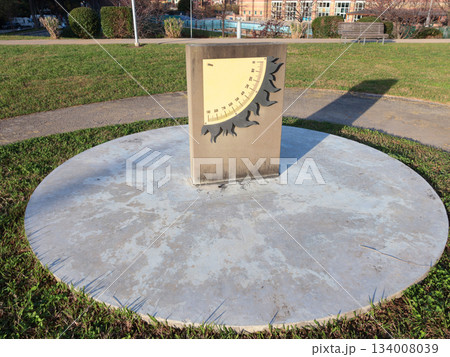 Sundial in park early in morning. Educational and models for astronomy. Sundial in park early in morning. Educational and models for astronomy. 134008039