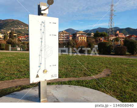 Sundial in park early in morning. Educational and models for astronomy.  134008040