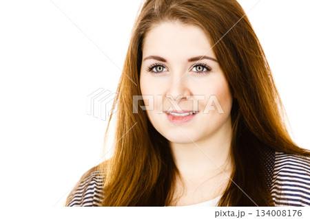 Portrait of beautiful young woman with brown hair 134008176