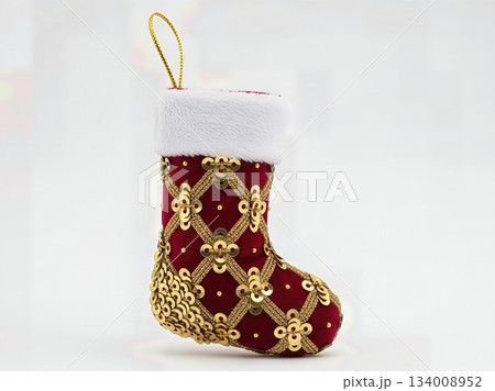 Sophisticated Gold Sequin Embellished Christmas Stocking Decoration Luxury Fabric Isolated Professional Product Photography Sophisticated Gold Sequin Embellished Christmas Stocking Decoration Luxury Fabric Isolated Professional Product Photography 134008952
