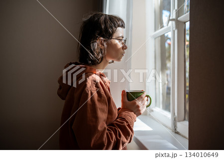 Outcast teen girl having social difficulties, problems in communication, spending time at home alone 134010649