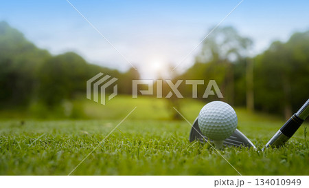 Close up of golf equipment on green grass. 134010949