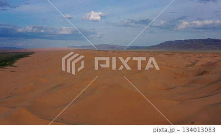 Aerial view of sand dunes in desert at sunset 134013083