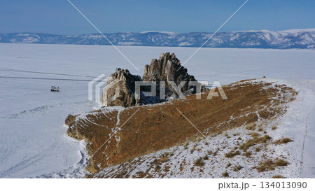 Shaman rock in frozen lake Baikal Shaman rock in frozen lake Baikal 134013090