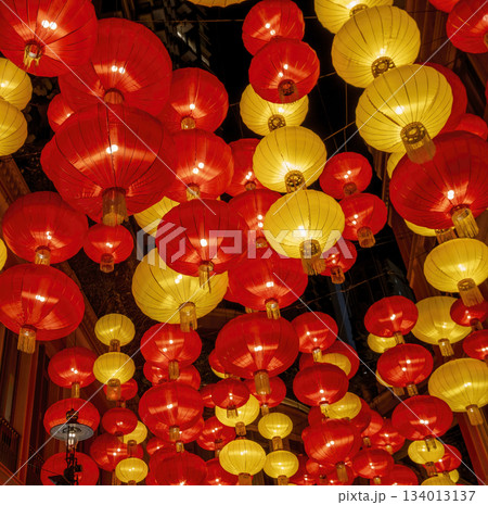 Colorful chinese lanterns illuminate evening street Colorful chinese lanterns illuminate evening street 134013137